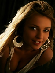 Charming blonde with adorable face and youthful allure.